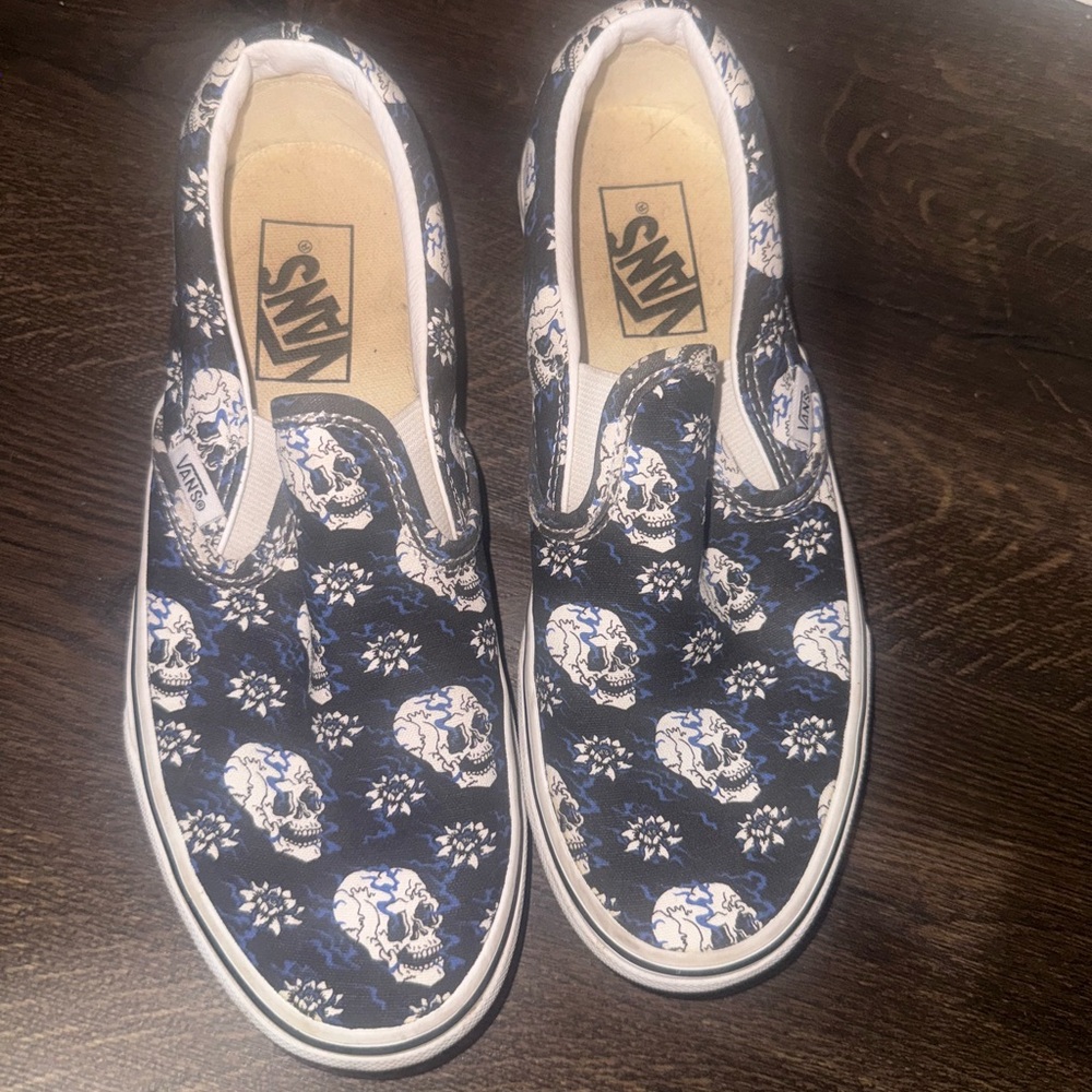 Vans women’s  Slip-On Sneakers - Black and Blue Skull Pattern